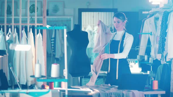 Seamstress is Experimenting with Fabric on the Dummy alt