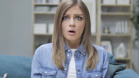 Portrait of Shocked Young Girl Wondering in Awe alt