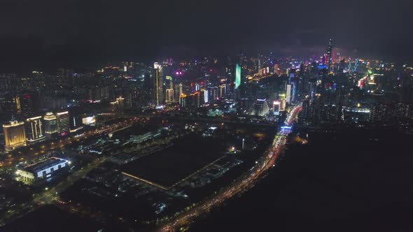 Shenzhen City at Night. Futian District and Shenzhen Bay. China. Aerial View alt