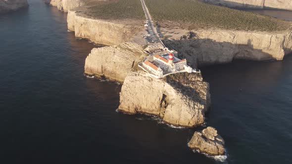 Aerial scenic view of Cabo de Sao Vicente headland, cliffs and the lighthouse, in Sagres alt
