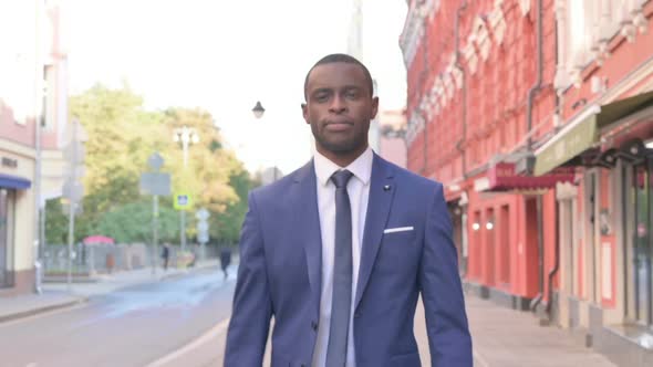 Walking African Businessman Going to Office alt