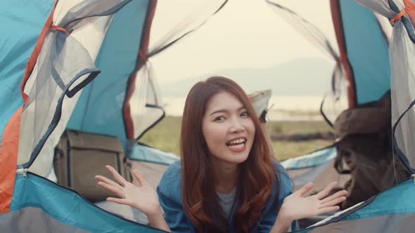 Asia teenagers girl influencer record footage introduce and camp place to her follower enjoy.