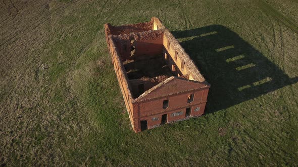 Ruins of Old Historical Building From Red Brick on the Field Aerial View