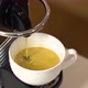 Pouring coffee stream from professional machine in cup. - VideoHive Item for Sale
