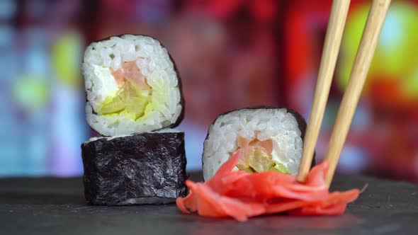 Sushi Rolls Close Up Take Chopsticks