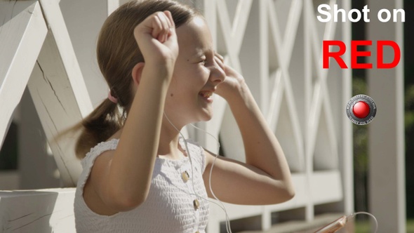 Listening To The Music In Headphones alt