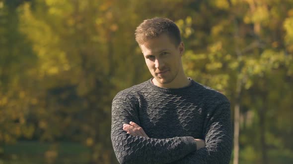  Male Laughing and Looking at Camera Shooting Video for Dating Agency alt