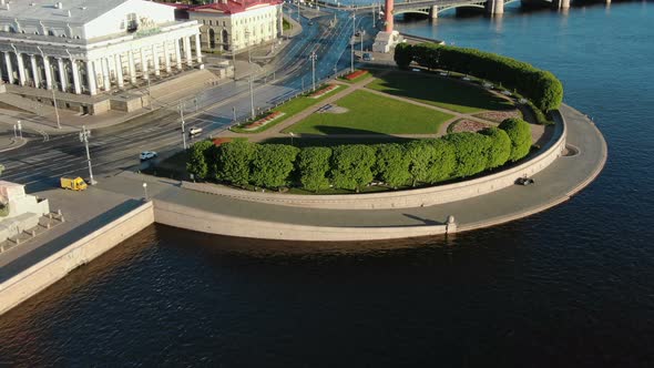 calm deep blue river between city parts bird eye flight alt