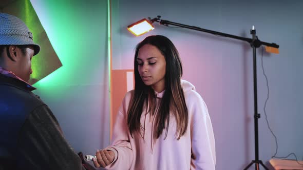Medium Shot of Multiracial Actors Burst in the Laugh During the Movie Shooting Scene alt