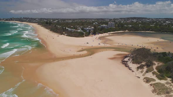 Aerial drone view of beach at Currimundi Lake, Caloundra, Sunshine Coast, Queensland, Australia alt