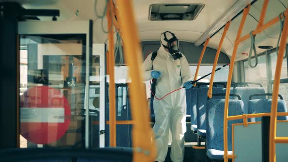Chemical Treatment Carried Out By the Sanitation Expert in the Bus alt