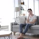 Pensive Young Man Thinking While Sitting on Sofa at Home - VideoHive Item for Sale