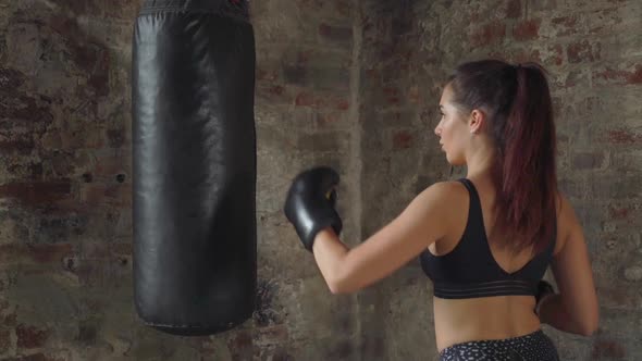 Young Girl Doing Boxing Workout in The Gym