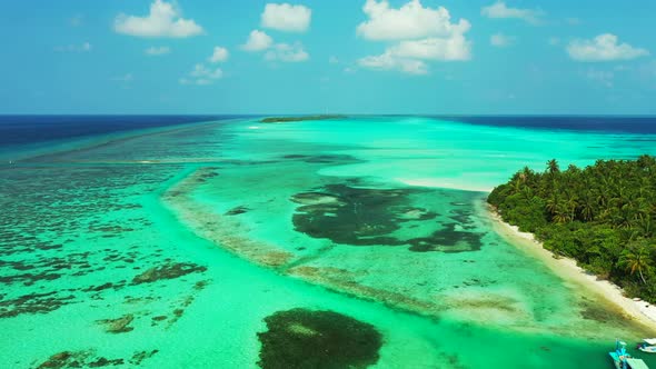 Luxury flying travel shot of a sunshine white sandy paradise beach and turquoise sea background  alt