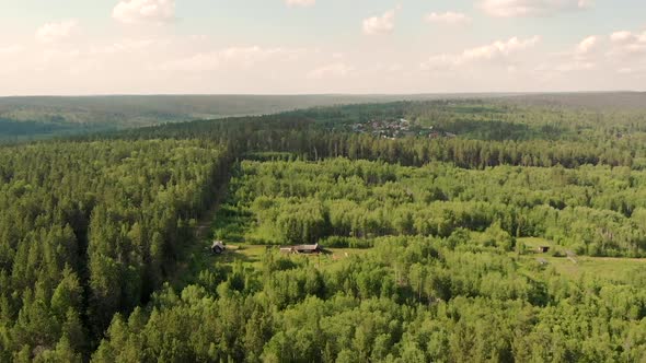 Aerial View From Drone of Country House Among Forest and Village in Background