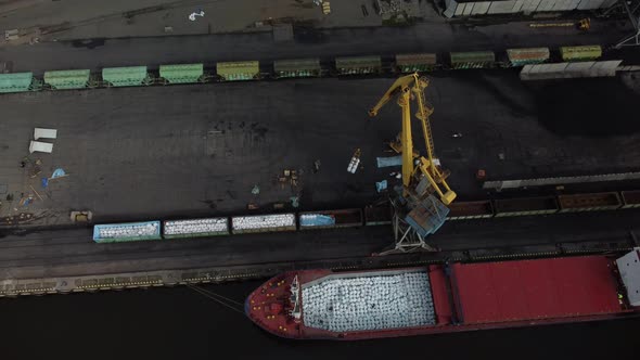 Loading Operations Using a Gantry Crane Taken From Above From a Bird'seye View on a Copter alt