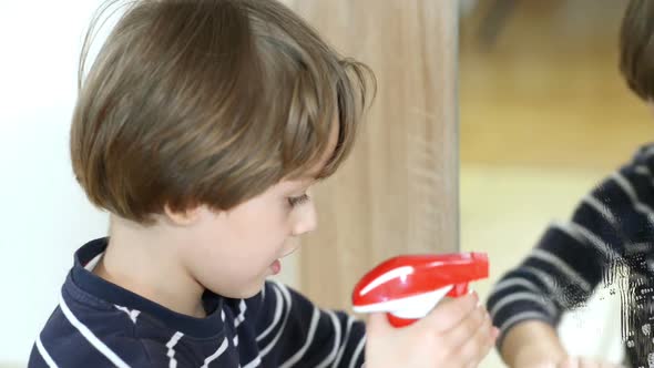 Boy Cleaning the Mirror alt