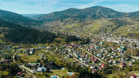 Aerial Drone Shot Over the Village Mountain Landscape alt