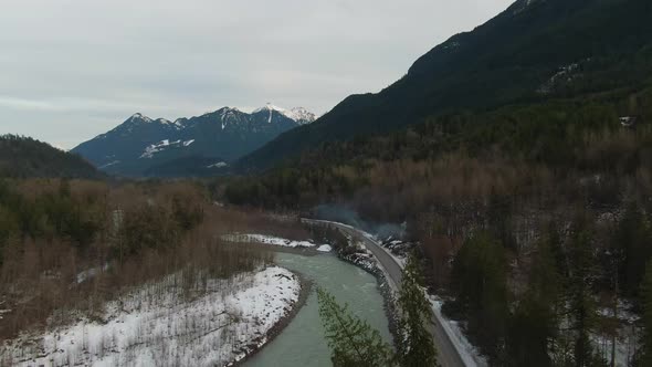 Aerial View of Chilliwack River with Snow During Winter Season alt