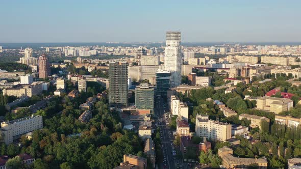 Aerial drone video of downtown skyline buildings and cars on the highway in Pecherskyi district of K alt