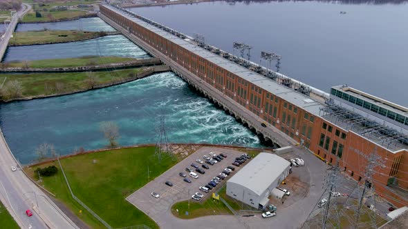 4K aerial view of the Beauharnois Hydroelectric Generating Station along the Saint Lawrence Seaway.