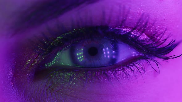 Extreme Close Up of Human Eye Iris Under Neon Light . Female with ...