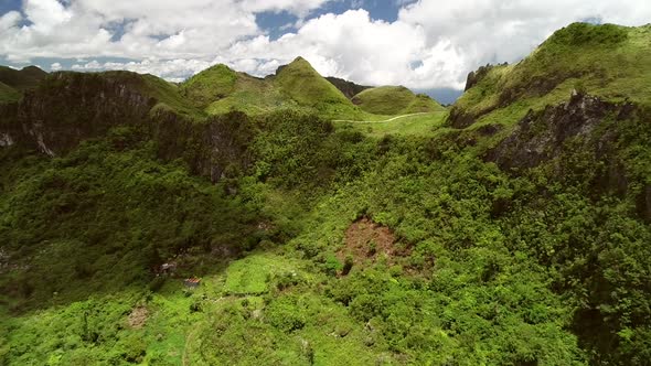 Aerial view of Chocolate hills and cloudy sky in Badian, Philippines. alt
