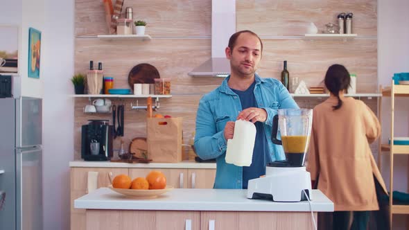 Pouring Milk in Blender alt