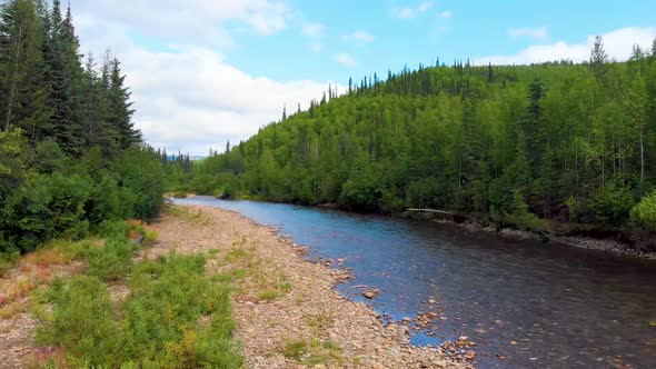 4K Drone Video (dolly shot) of Rock Shoreline of Chena River at Angel Rocks Trailhead near Fairbanks alt