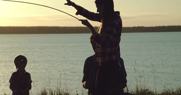 The Family Assembles the Tent on a Camping Trip alt