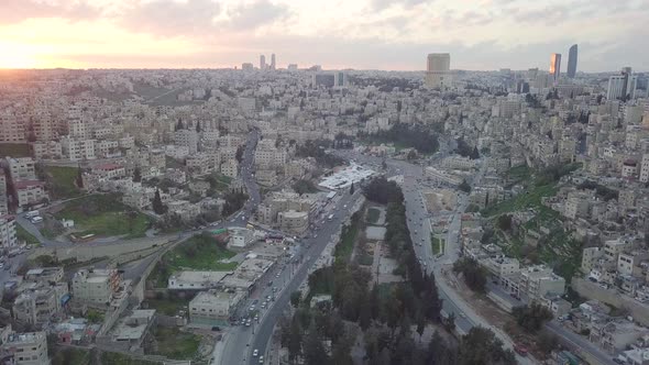 Early morning aerial clip of Amman Jordan taken by a drone just after sunrise with beautiful colors alt
