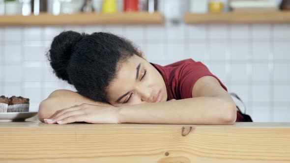 Sleepy Barista Woman Showing Depressed and Unhappy Emotion