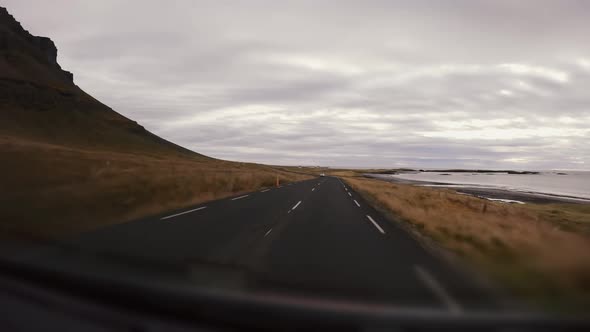 Driving Through Curved Road Around Fjord Road Time Lapse