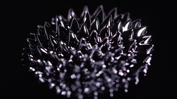 Ferrofluid moving around as magnetic forces change its shape., Stock ...