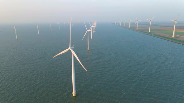 Huge Windmill Turbines Offshore Windmill Farm in the Ocean Westermeerwind Park Windmills Isolated at alt