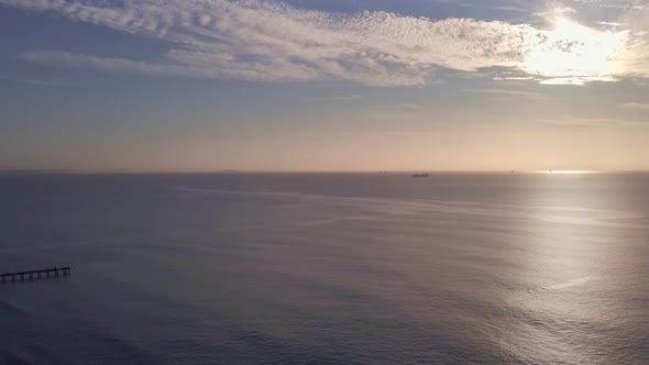 Aerial View of Ocean with Ships Seen in Horizon