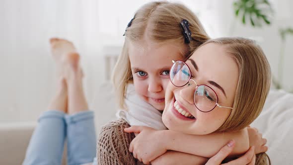 Family Portrait Little Beloved Caucasian Daughter Adorable Preschool Girl Child Kid Sitting on alt