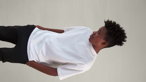 African American Teenager Showing COVID19 Vaccine Bandage Merrily alt