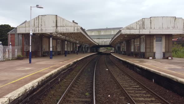 A Drone View of the Railroad Tracks in Front of the Station alt