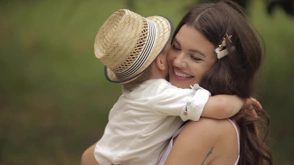 Loving Mother Hugging with Her Son.