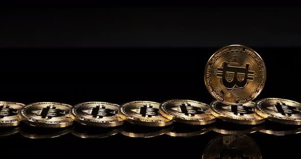 Bitcoins on Black Background, slow motion 4K alt