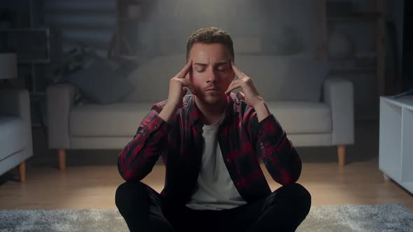 A Young Man Comes Up with an Idea at This Time a Bright Magical Light Burns Over Him alt