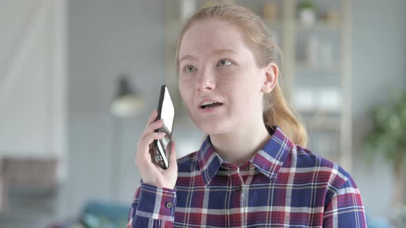 Close Up of Young Woman Speaking on the Phone alt