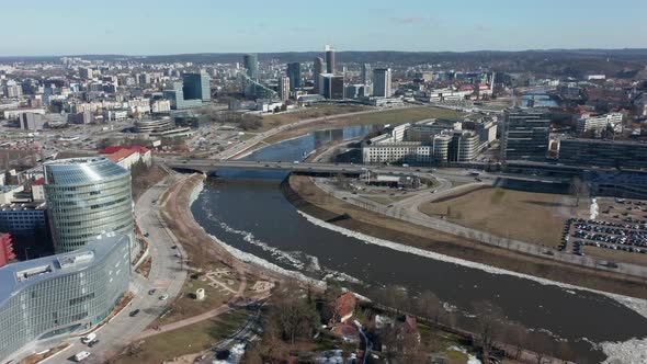 AERIAL: Flying Over River Neris Towards Roundabout in Vilnius