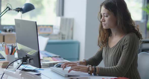 Interior designer working with her computer