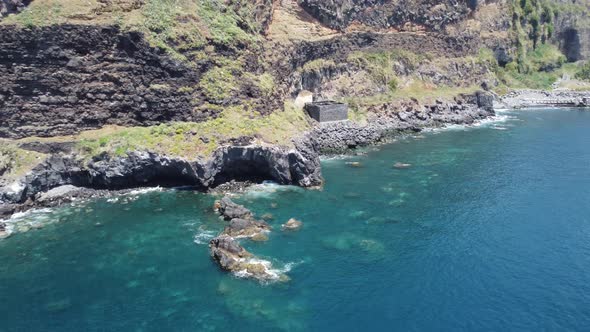 Rocks and cliff edges by the sea in Madeira. Shot on DJI. alt