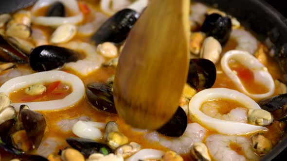 Close Up Paella Is Stewed in Pan. Cooking Vegetarian Healthy Dinner, Recipe