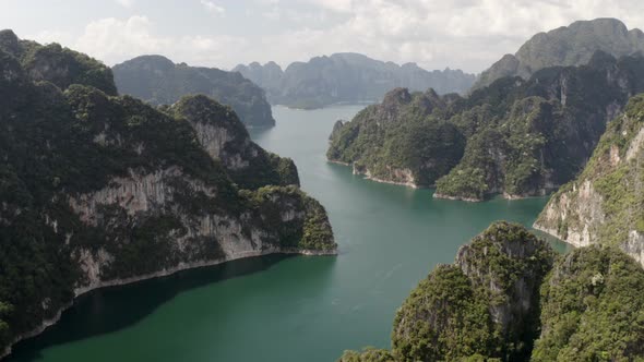 Drone Shot of Mountains and the Lake at the National Park of Thailand alt