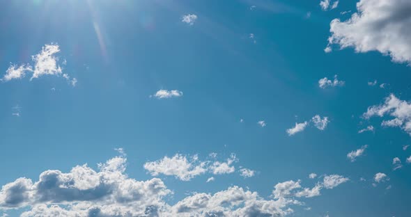 Blue Sky with Wonderful White Clouds Floating on Windy Day alt