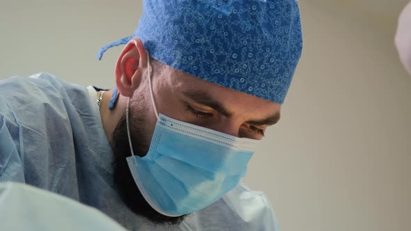 Close Up of Doctor Doing Surgery in the Hospital alt